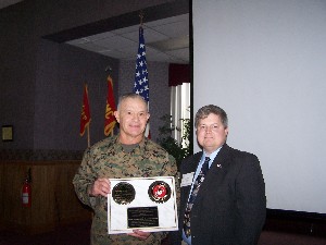 Egge thanks guest speaker Maj. Gen. Dennis J. Hejlik (l), who delivered an overview of Marine Forces Special Operations Command at the chapter's conference and exhibition in January.
